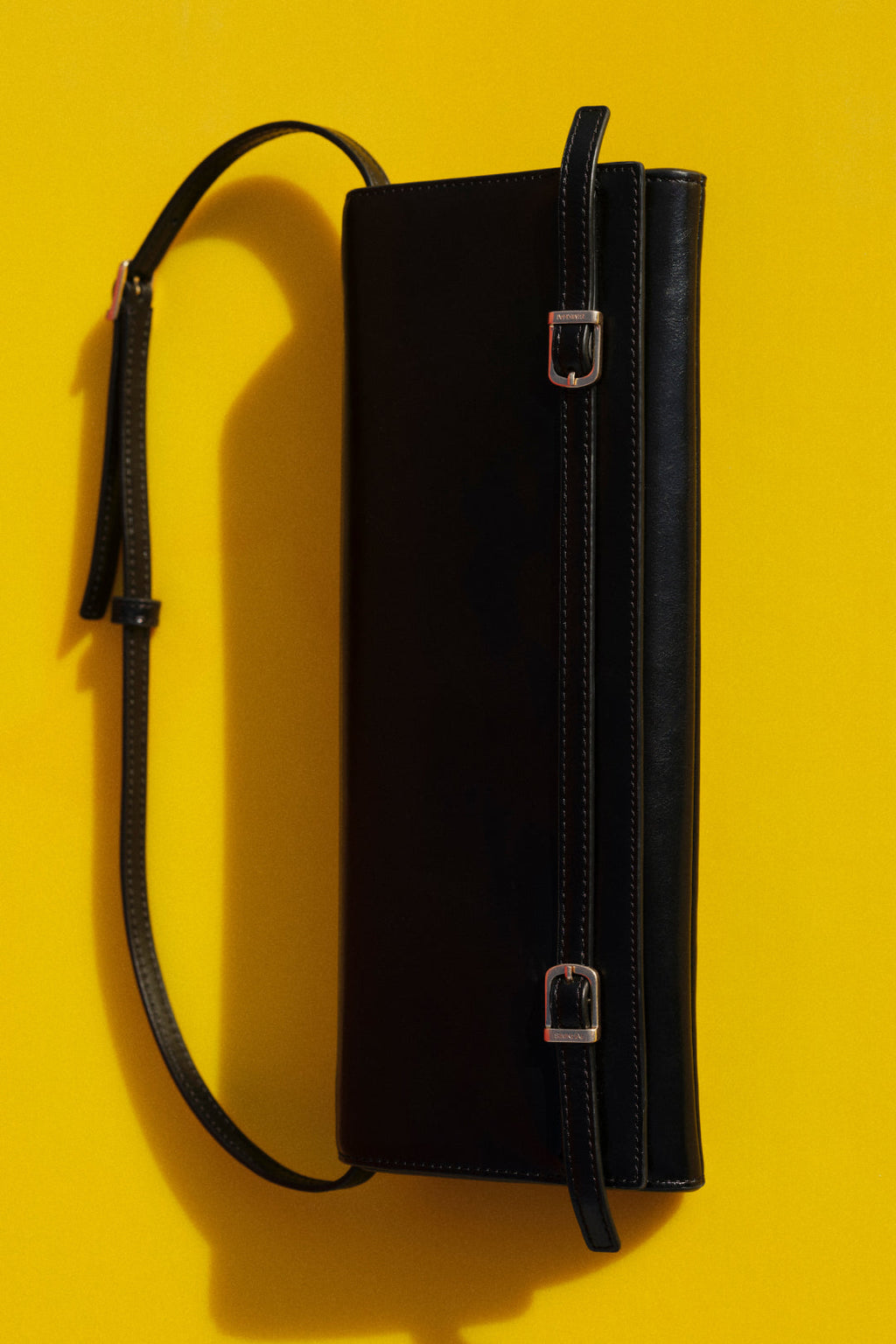 River East West Leather Clutch